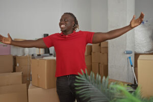 Happy man moving in